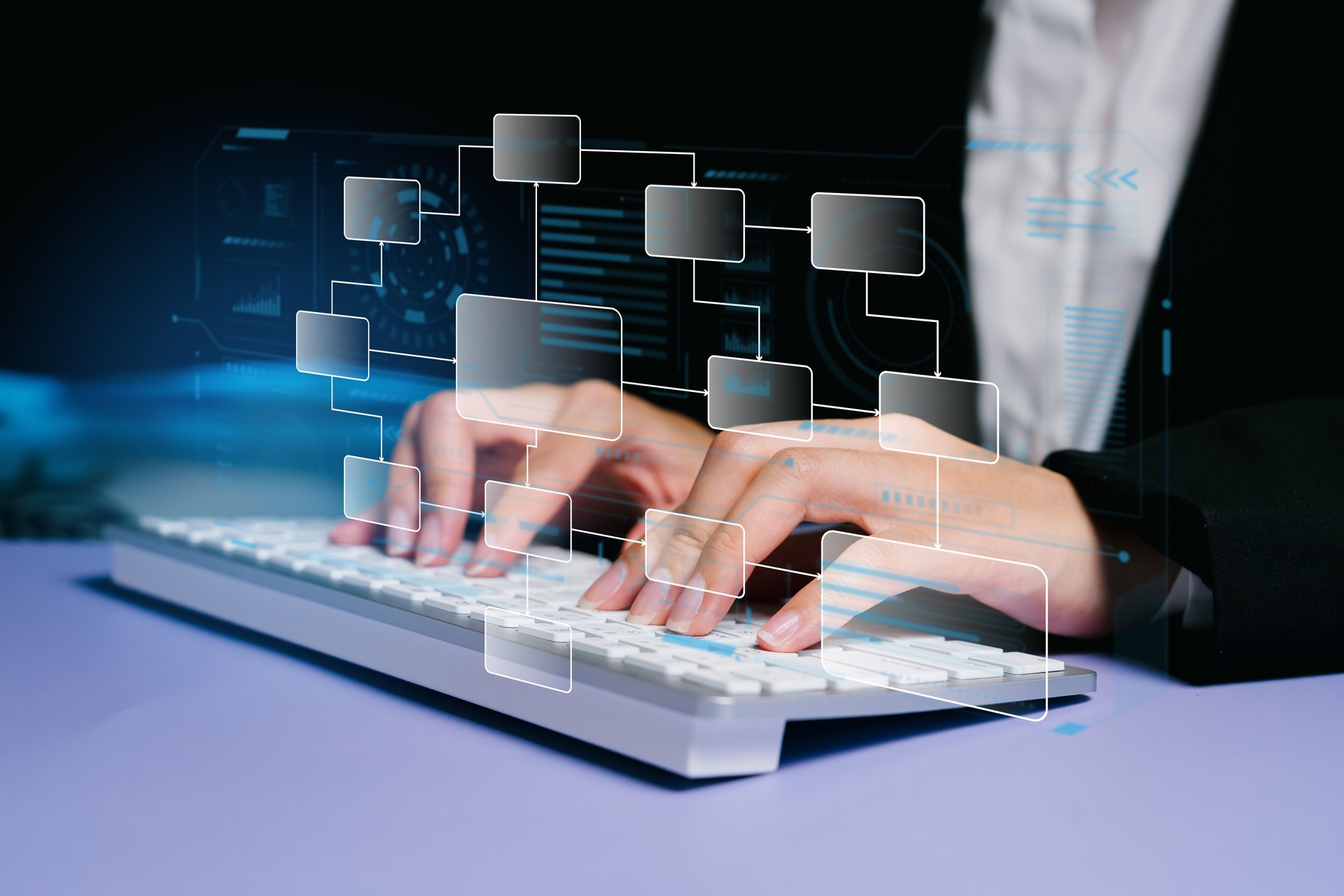 Professional Person Typing on a Keyboard with Digital Flowchart Overlay in a Modern Office Setting